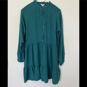 Teal trapeze still dress with wide ruffle.